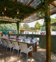 olive-branch-table-set-up-outside